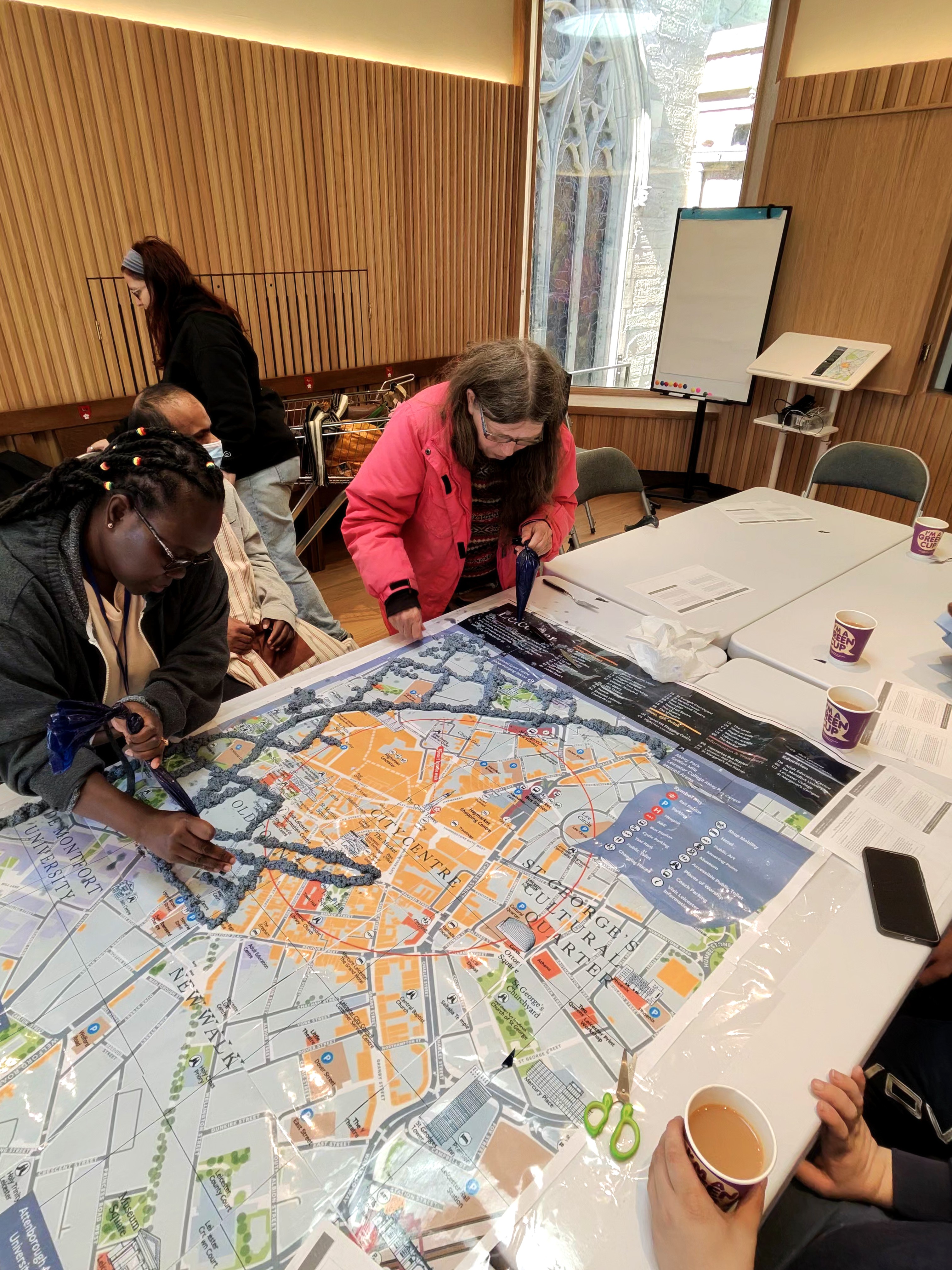 Working on the road lines that connect the city across the joined map.